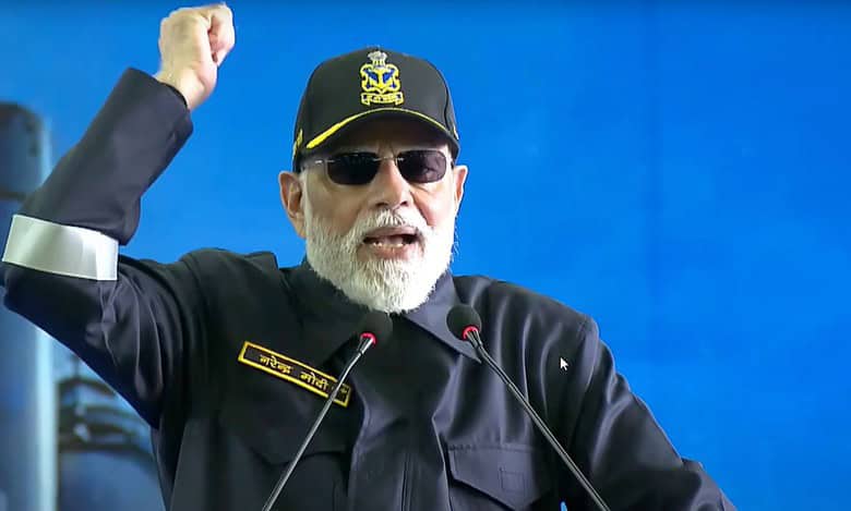 Prime Minister Narendra Modi addresses the Indian Navy personnel during Diwali celebration aboard INS Vikrant. (PMO via PTI Photo)