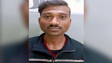 Accused Akil Khan after his arrest for allegedly stalking and molesting two Australian women cricketers taking part in the ongoing ICC Women's Cricket World Cup, in Indore, Madhya Pradesh, Saturday, Oct. 25, 2025. (PTI Photo)