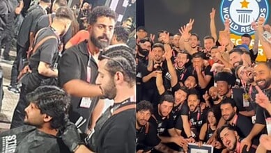 Barbers in Dubai performing beard trims and celebrating after setting a new Guinness World Record at Beautyworld Middle East 2025.