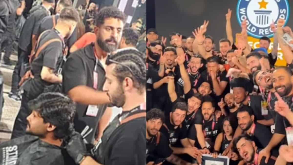 Barbers in Dubai performing beard trims and celebrating after setting a new Guinness World Record at Beautyworld Middle East 2025.