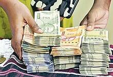 Cash and liquor seized during checks by Flying Squad Teams of the Election Commission of India in Jubilee Hills constituency.