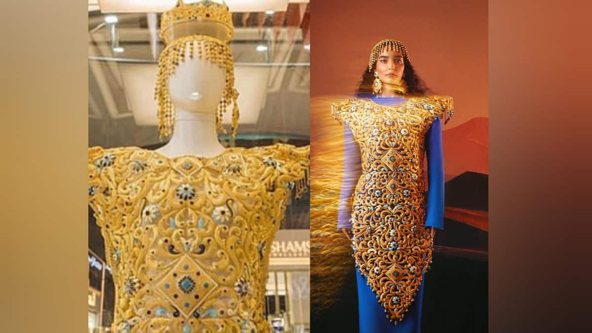 The “Dubai Dress,” crafted by Al Romaizan Gold and Jewellery, an intricately engraved 21-karat gold gown adorned with gemstones and a matching headdress.