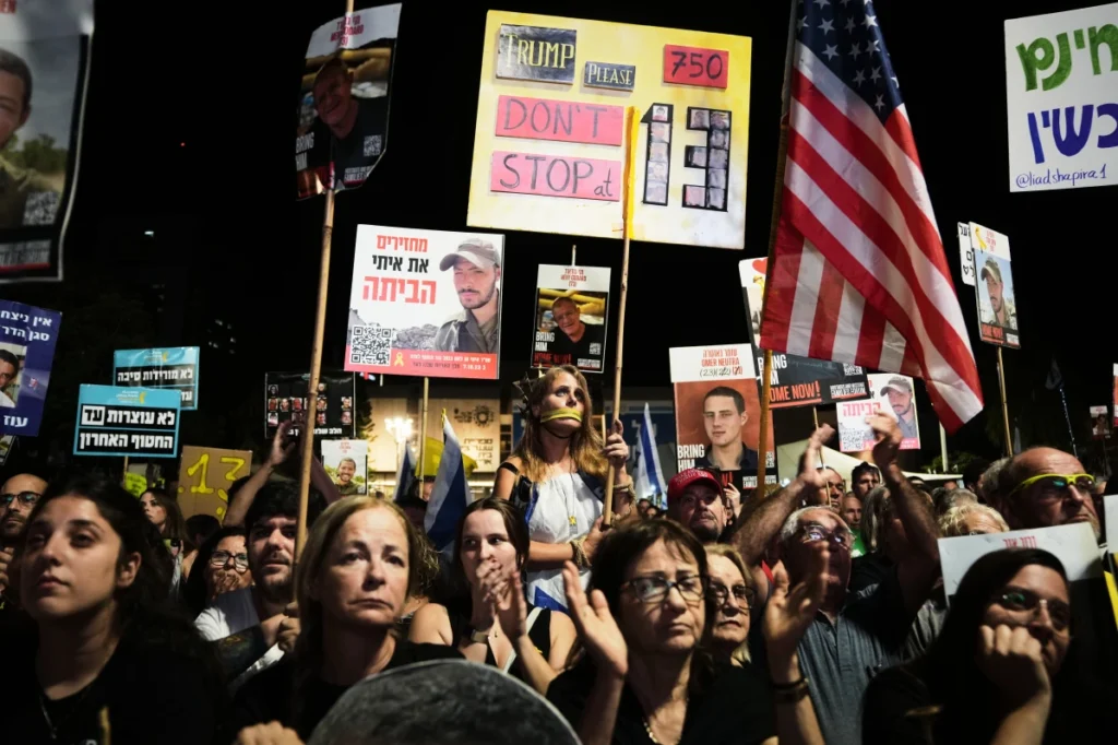 Relatives and supporters of hostages held by Hamas gather at a rally in Israel calling for their release.