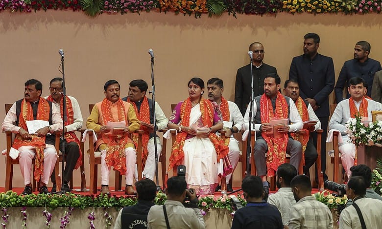 Gujarat's newly-sworn cabinet ministers during the swearing-in ceremony, in Gandhinagar, Friday, Oct. 17, 2025. (PTI Photo)