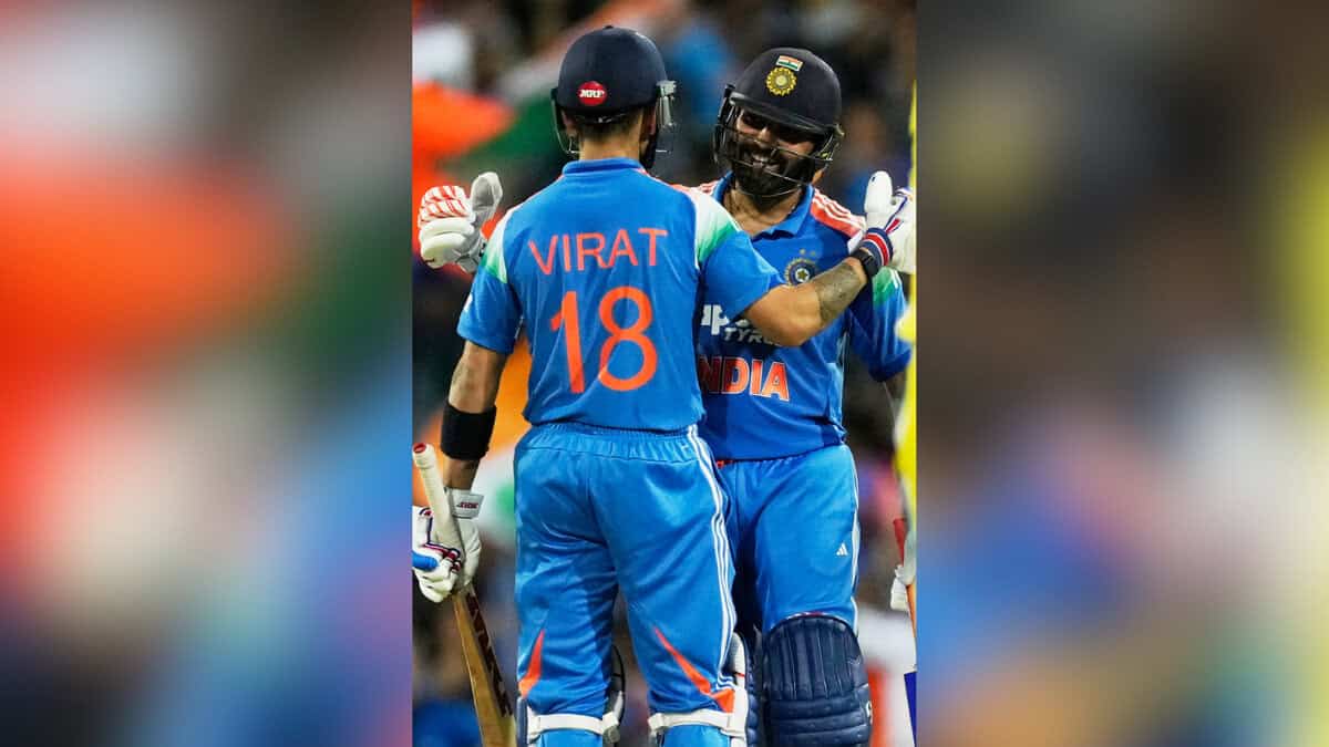 Virat Kohli and Rohit Sharma celebrate their India vs. Australia 3rd ODI