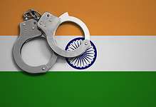 India flag and police handcuffs. Indian Justice System