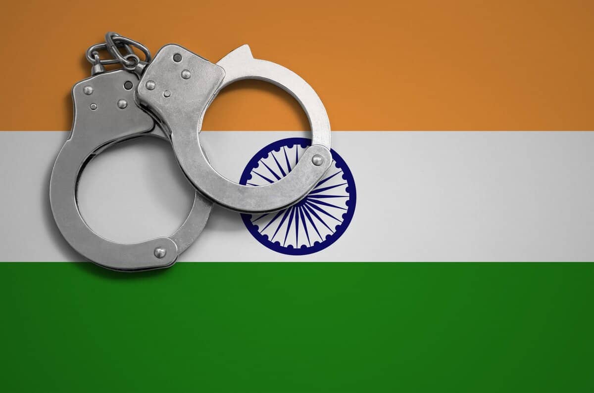 India flag and police handcuffs. Indian Justice System