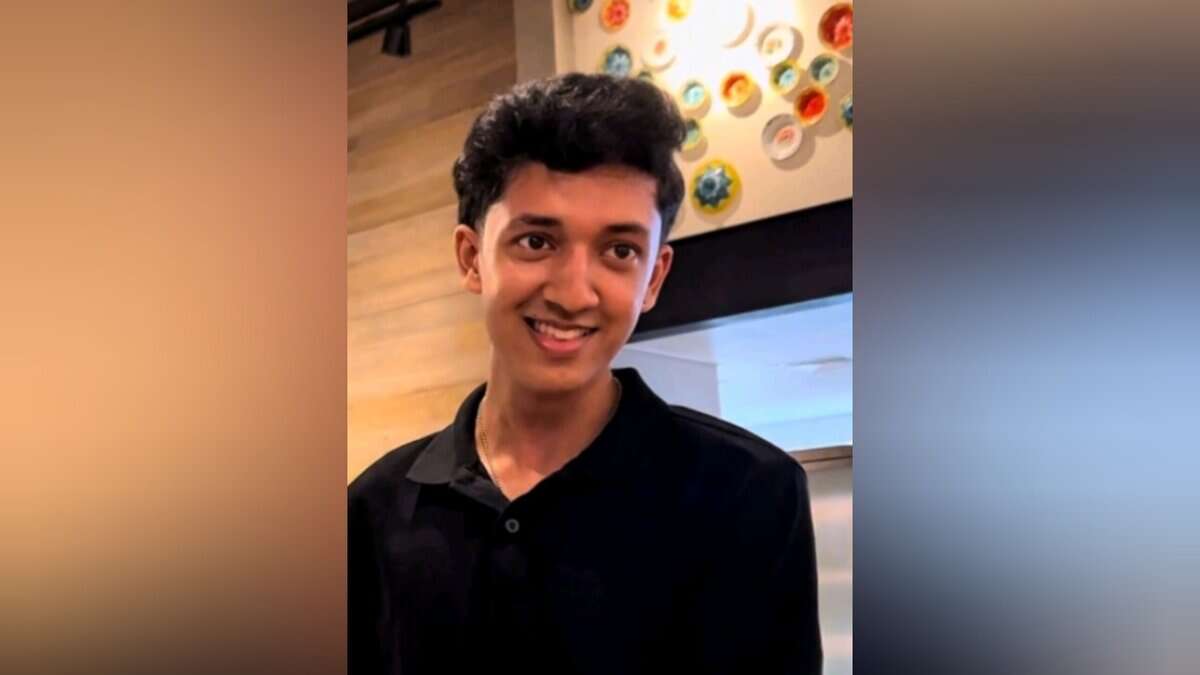 Vaishnav Krishnakumar, an 18-year-old Indian student in Dubai, smiling in a casual indoor setting.