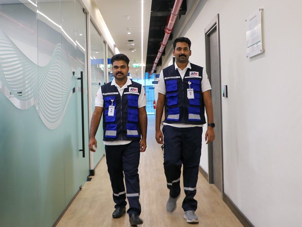 Abhijith Jees and Ajeesh Nelson walk through the Response Plus Medical facility in Abu Dhabi.