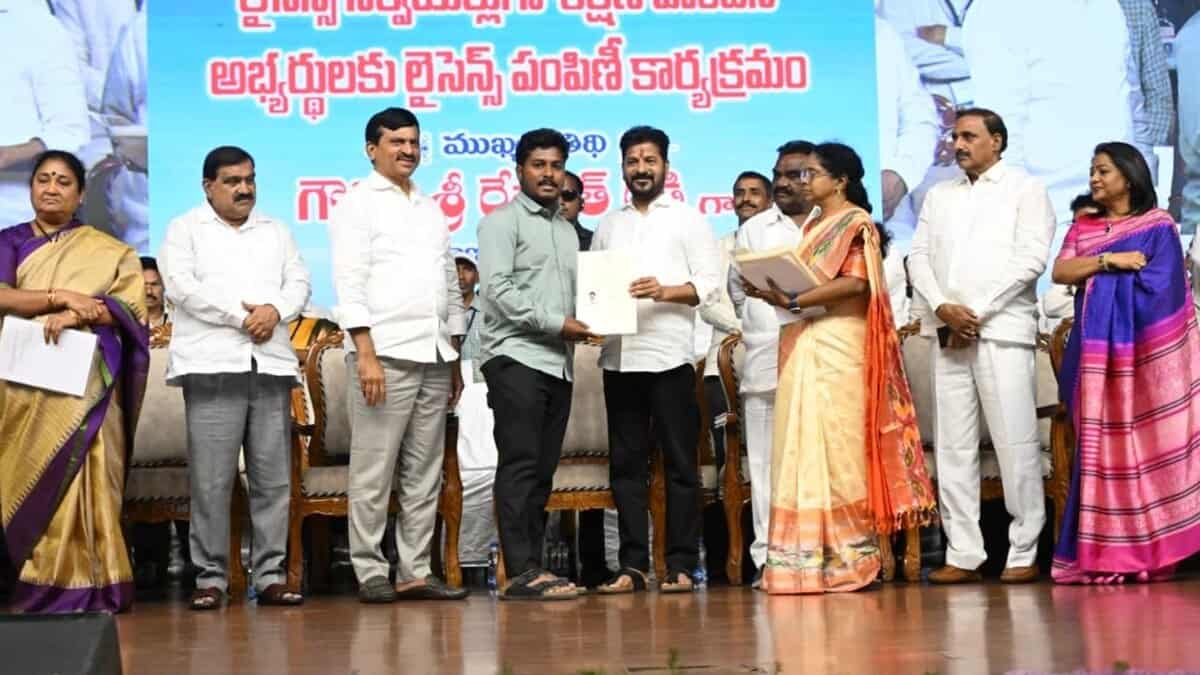 Chief Minister A Revanth Reddy distributes licenses to trained land surveyors in Hyderabad