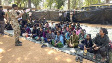 Maoists at the Border Security Force (BSF) camp after their surrender, in Kanker district, Chhattisgarh. (Handout via PTI Photo)