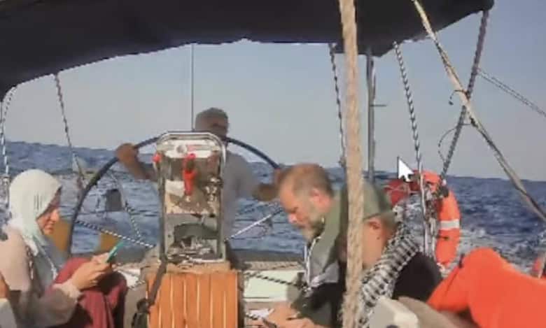 People onboard the Marinette vessel sailing in the Mediterranean Sea.