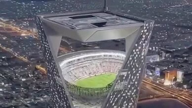 A digital image shows a football stadium inside the top of a tall tower in Saudi Arabia’s NEOM city.