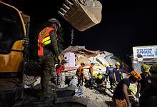 Rescuers search for survivors underneath rubble in Bogo city, Philippines, Wednesday, Oct. 1, 2025. AP/PTI