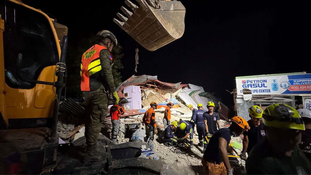Rescuers search for survivors underneath rubble in Bogo city, Philippines, Wednesday, Oct. 1, 2025. AP/PTI
