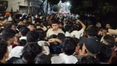 Image of a mob gathering in Akbarbagh, Hyderabad after a Durga idol was desecrated.