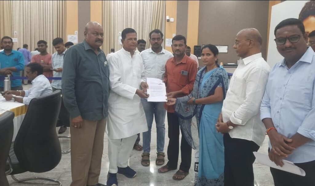Dharmapuri Anand and family members submit a petition at CM Pravasi Prajavani in Hyderabad seeking government assistance to perform last rites of Sreepada Naresh in Bahrain.