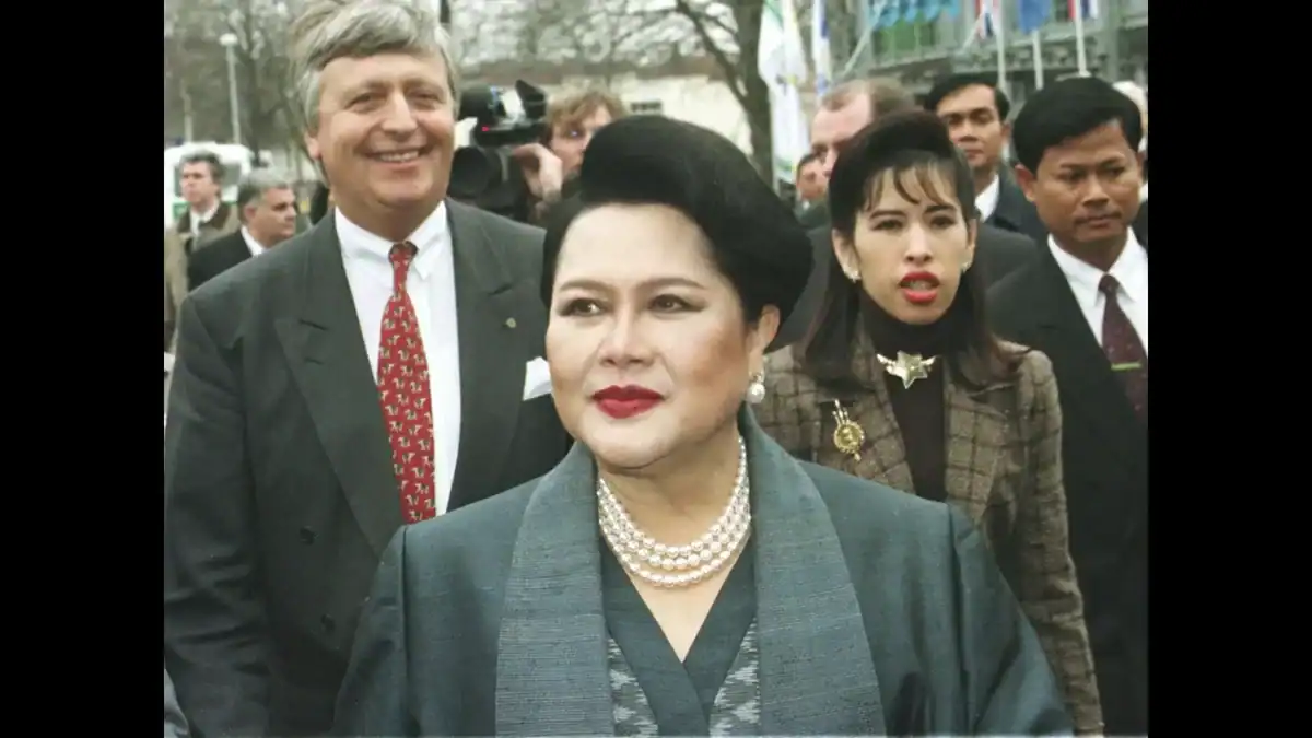 Thailand’s Queen Mother Sirikit attending a public event with officials and aides.