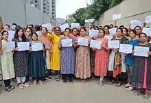 Residents in Erragadda protest against allotment of land for Muslim graveyard in their locality.