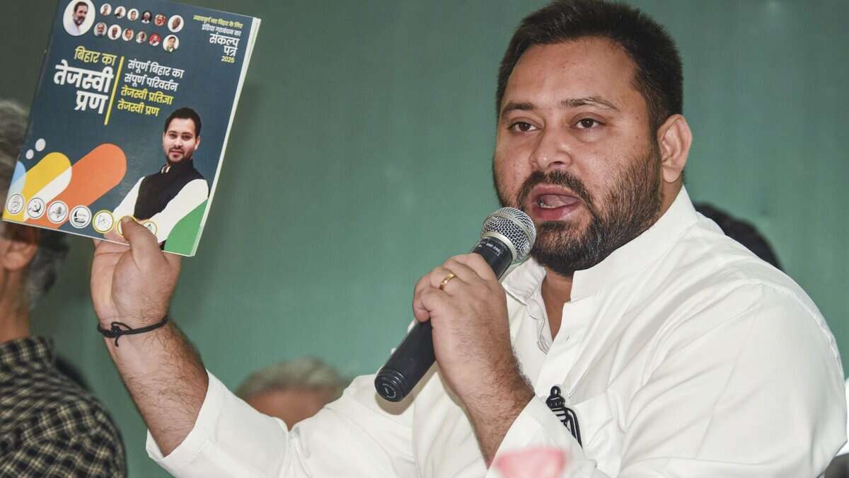 Patna: LoP in Bihar Assembly and RJD leader Tejashwi Yadav addresses the media after releasing INDIA bloc's manifesto for Bihar Assembly elections, in Patna, Tuesday, Oct. 28, 2025. (PTI Photo)