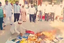 Hindutva mob forces Christians in Rohtak to burn holy books.