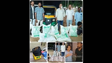 Telangana excise officials with seized ganja and jaggery