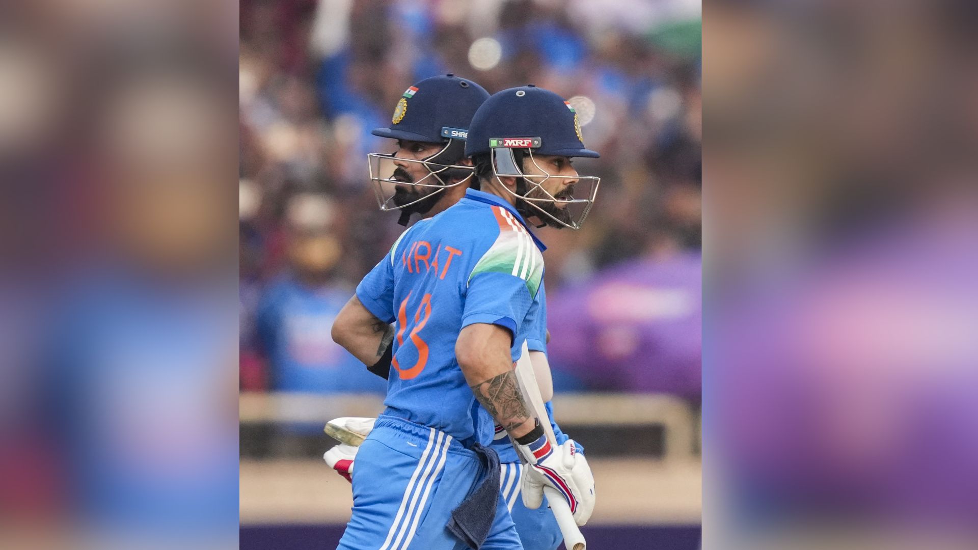 India's Virat Kohli, front, and KL Rahul run between the wickets during the first ODI cricket match of a series between India and South Africa at JSCA International Stadium Complex in Ranchi on Sunday. (PTI Photo/Kamal Kishore
