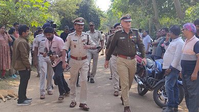 Police inspect the bomb site in Bhubaneshwar