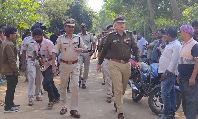 Police inspect the bomb site in Bhubaneshwar