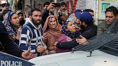 Relatives stage a protest demanding the mortal remains of Mohammad Shafi Parry
