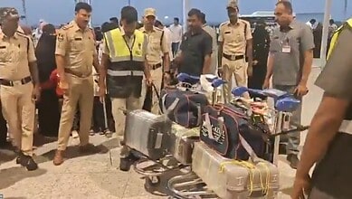 Cyberabad police officials inspect luggage at Hyderabad airport