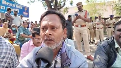 An NHM employee speaks to the media during protest in Hyderabad