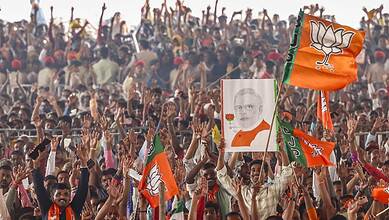n this image posted on Nov. 3, 2025, Supporters hold a portrait of Prime Minister Narendra Modi during a rally ahead of the Bihar Assembly elections, in Saharsa. (narendramodi.in via PTI Photo)