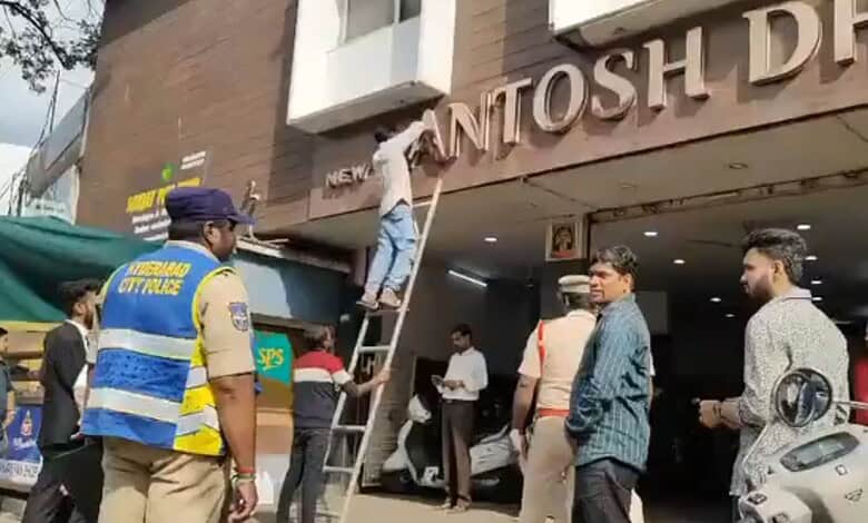 Officials pull down duplicate Santosh Dhaba signboards in Hyderabad