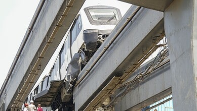 A portion of a monorail train damaged after it tilted during a test run, at Wadala depot in Mumbai, Wednesday, Nov. 5, 2025. No injury was reported in the incident, according to officials. (PTI Photo/Shashank Parade)