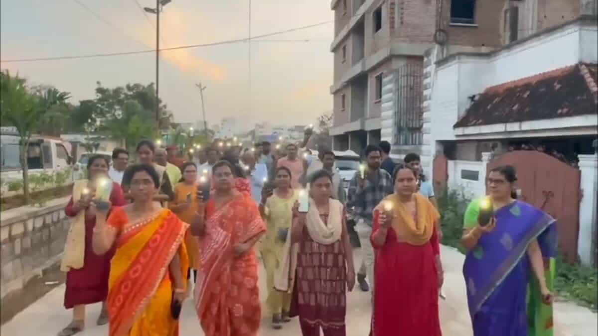 Women participate in a rally for HYDRAA in Manikonda