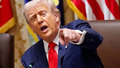 US President Donald Trump addresses a meeting