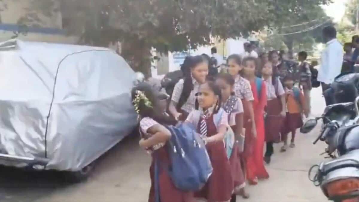 students walk in line after the government school was locked over non-payment of rent