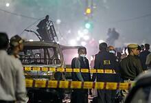 National Investigation Agency (NIA) team at the spot after a blast occurred in a parked car near Red Fort leaving multiple vehicles in flames on Monday. At least nine people were killed and 24 others suffered injuries in the incident. (PTI Photo/Salman Ali)