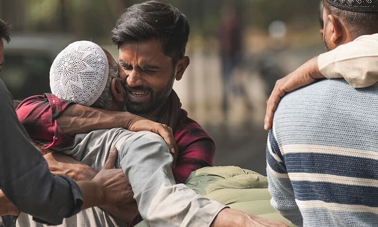 New Delhi: Relatives of Nouman, who died in the blast near Red Fort, mourn, outside a mortuary at Maulana Azad Medical College, New Delhi, Tuesday, Nov. 11, 2025. A high-intensity blast occured near the metro station on Monday evening, killing 12 people and gutting several vehicles.(PTI Photo/Karma Bhutia)
