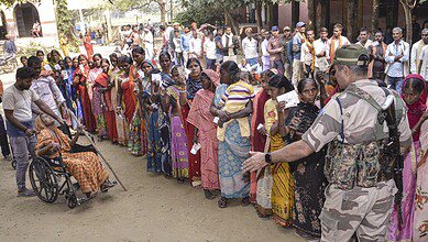 A security personnel keeps vigil at a polling station during the second and final phase of the Bihar Assembly elections in Jehanabad on Tuesday. (PTI Photo)