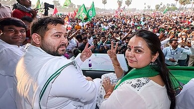 RJD leader Tejashwi Yadav with his sister Rohini Acharya during a poll campaign in Bihar.