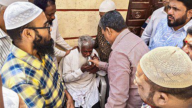 AIMIM Karwan MLA Kausar Mohiuddin meets family members of those who lost their lives in a bus fire accident in Madinah, Saudi Arabia on Monday. (PTI Photo)