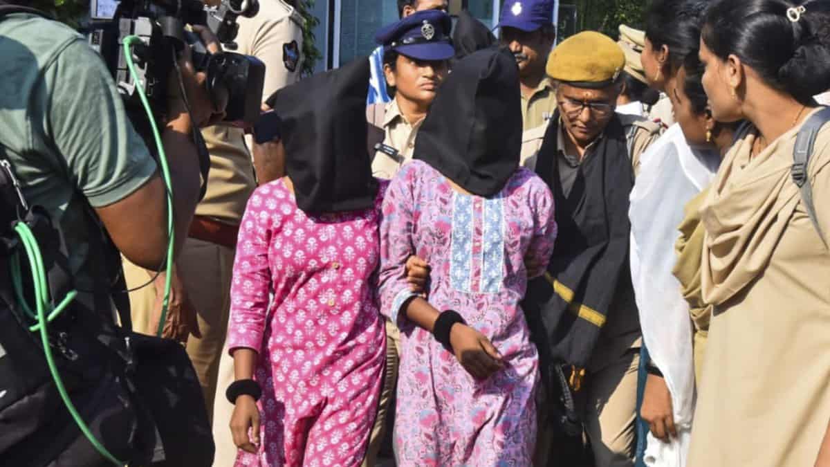 Vijayawada Police personnel with arrested Maoists in a coordinated intelligence-led operation in Andhra Pradesh. State Police arrested 50 CPI (Maoist) cadres across five districts. The crackdown coincided with an encounter at Maredumilli on Wednesday. (PTI Photo)