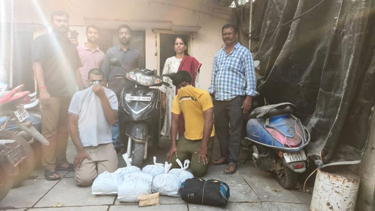 Excise police with two accused arrested for ganja peddling in Hafeezpet