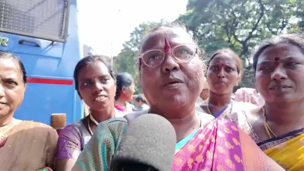 A Midday meal workers addresses the media during the protest