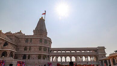 In this screenshot from a video posted on Nov. 25, 2025, A saffron flag being ceremonially hoisted by Prime Minister Narendra Modi, unseen, atop the Ram temple during a ceremony, in Ayodhya, Uttar Pradesh. (@NarendraModi/YT via PTI Photo)