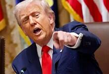 US President Donald Trump addresses a meeting