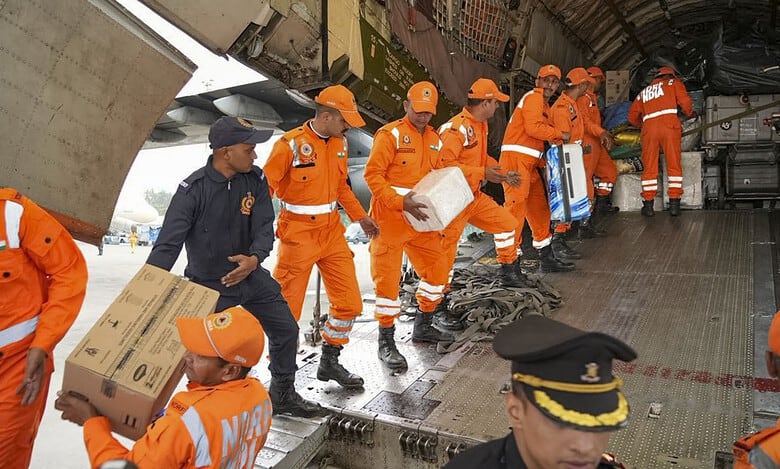 NDRF personnel along with a consignment of Indian humanitarian aid, arrive in cyclone-hit Sri Lanka as part of 'Operation Sagar Bandhu'. (@DrSJaishankar/X via PTI Photo)