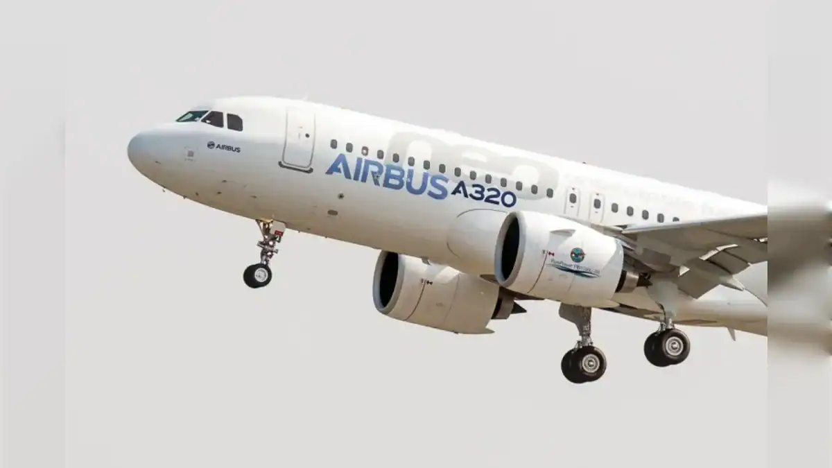 Airbus A320 approaching for landing with landing gear extended.